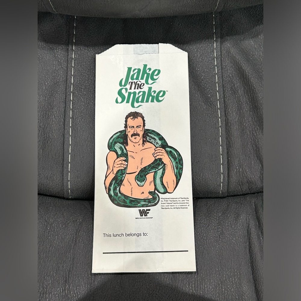 Vintage WWF Jake “the snake” Roberts lunch bag!